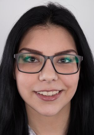 1 dark haired female tortures another during lezdom play in concrete cellar